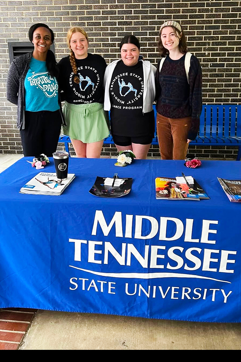 Jade Treadwell, left, director of the Dance Program at Middle Tennessee State University in Murfreesboro, Tenn., stands with members of the MTSU Dance Society, from left, Natalie McCutcheon, Morgan Hayes and Lily Hall, during a College of Liberal Arts student engagement event, April 19, 2024. Purpose of the MTSU Dance Society is to encourage student leadership and advocacy for the MTSU Dance Program. (Courtesy photo)