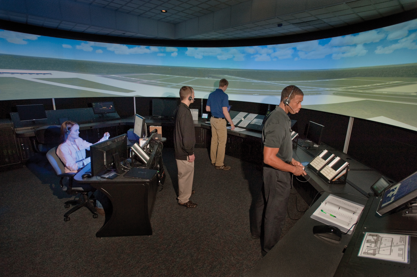 L-R Lanna Martin, Kamil Korona, Steven Turner, and Bryce Middleton in the MTSU Aerospace Department Air Traffic Control tower simulator lab in BAS.