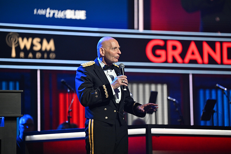 Retired Army Lt. Gen. Keith Huber, senior adviser for veterans and leadership initiatives at Middle Tennessee State University in Murfreesboro, Tenn., shares details about the support services offered by MTSU’s Charlie and Hazel Daniels Veterans and Military Family Center while serving as a guest announcer Tuesday, May 20, at the Grand Ole Opry’s annual Salute the Troops celebration in Nashville, Tenn., that also included observance of the 250th birthday of the U.S. Army. (MTSU photo by James Cessna)