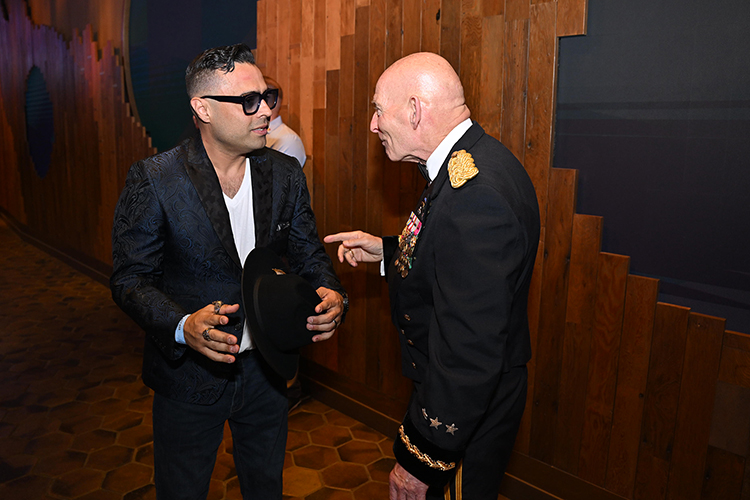 Retired Army Lt. Gen. Keith Huber, senior adviser for veterans and leadership initiatives at Middle Tennessee State University in Murfreesboro, Tenn., right, chats with country music artist Sal Gonzalez on Tuesday, May 20, at the Grand Ole Opry’s annual Salute the Troops celebration in Nashville, Tenn., that also included observance of the 250th birthday of the U.S. Army. Huber and Army Maj. Gen. Brett Sylvia, commander of the 101st Airborne Division at Fort Campbell, Ky., helped welcome Gonzalez and other artists along with the 100th Army Band. (MTSU photo by James Cessna)