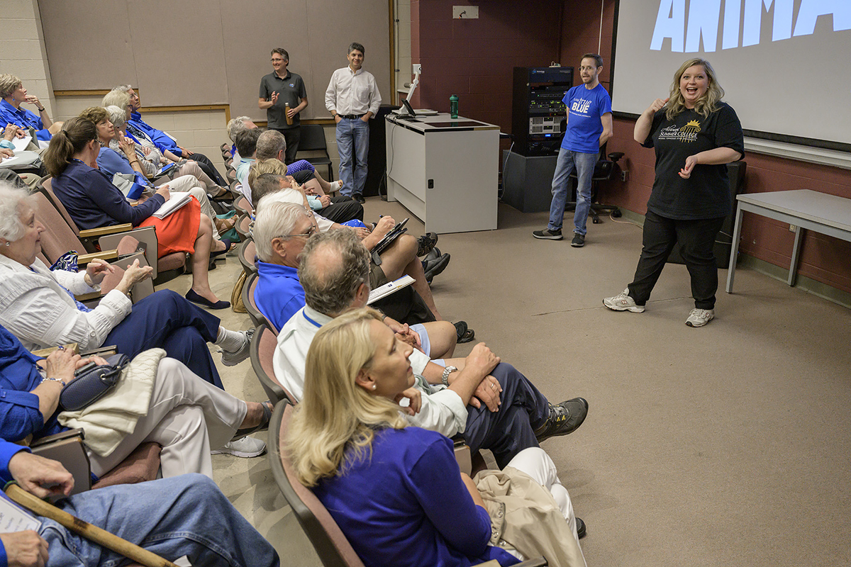 MTSU Alumni Relations assistant director Rhonda King, right, welcomes the 12th annual Alumni Summer College attendees to the “That’s Entertainment” session on animation recently in the John Bragg College of Media and Entertainment Building. The three-day event drew 75 alumni and friends of the university in June. (MTSU photo by Andy Heidt)