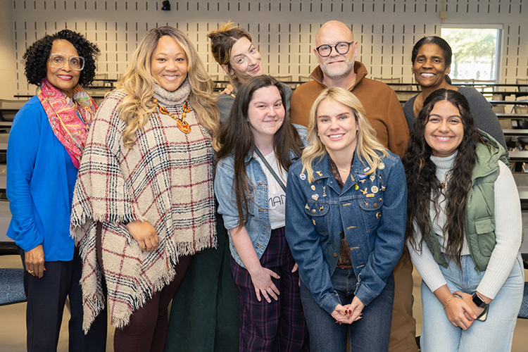 State Rep. Aftyn Behn, front row, fourth from left, takes a group photo after talking to Middle Tennessee State University social work students, faculty and administration about the connection of social justice work and policy change at a lecture Nov. 2, 2023, at the Cason-Kennedy Nursing Building. Pictured are, front row, from left, lecturer Toni Owens; Sarah Robinson, social work graduate assistant; Behn; Barthena Meseha, social work graduate assistant; and back, from left, lecturer Violet Cox-Wingo; and social work graduate students Erin Sheehan, Scott Coble and Phoebe Wade. (MTSU photo by James Cessna)