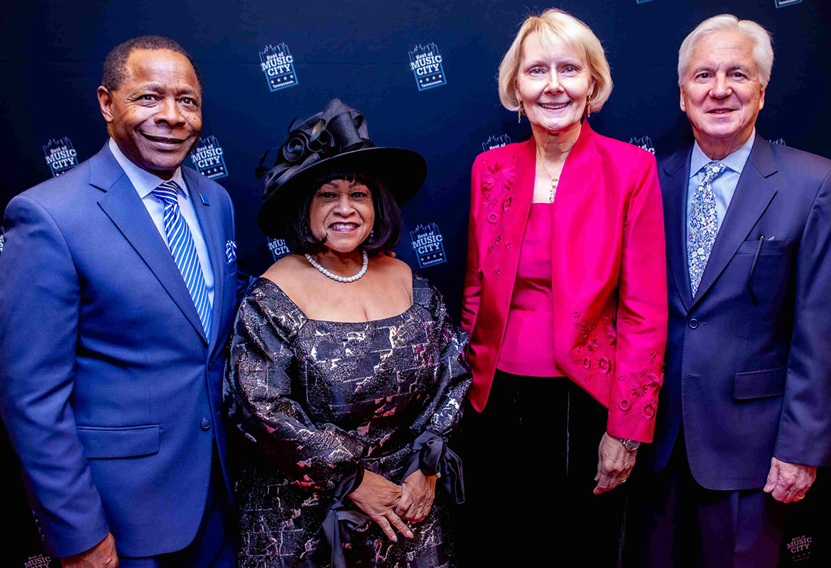 MTSU President Sidney A. McPhee and his wife, Elizabeth, along with MTSU Trustees Vice Chair Christine Karbowiak Vanek and her husband, Marty, pose for a photo on the red carpet at the Dec. 8 ceremony for the 2023 Best of Music City Community’s Choice Awards. (Tennessean photo)