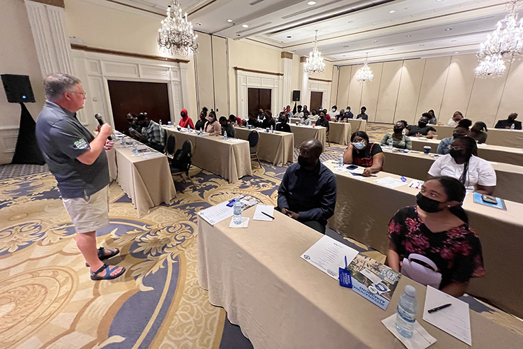 Provost Mark Byrnes answers questions from prospective students Wednesday, Dec. 15, at a reception sponsored by MTSU in Nassau, the capital of the Commonwealth of The Bahamas. (MTSU photo by Andrew Oppmann)