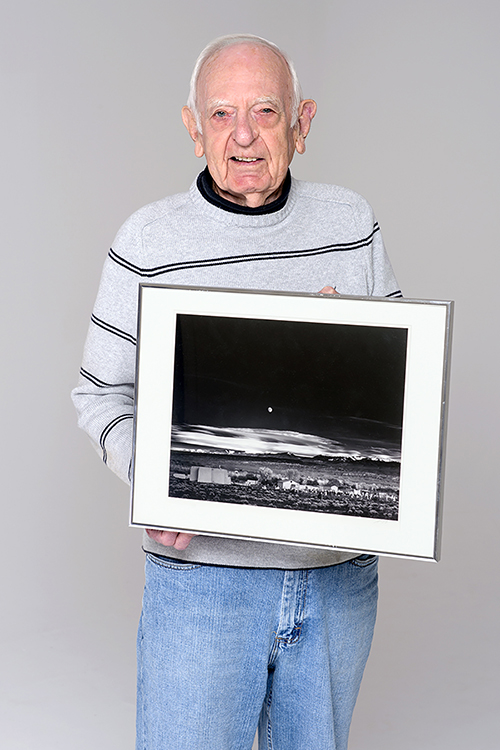 MTSU Professor Emeritus Harold L. Baldwin displays one of the masterpieces in the renowned university gallery collection that bears his name: the Ansel Adams print of "Moonrise, Hernandez, New Mexico." Baldwin, 93, founder of MTSU's photography program and a former president of the Faculty Senate, died March 19. (MTSU file photo by J. Intintoli)