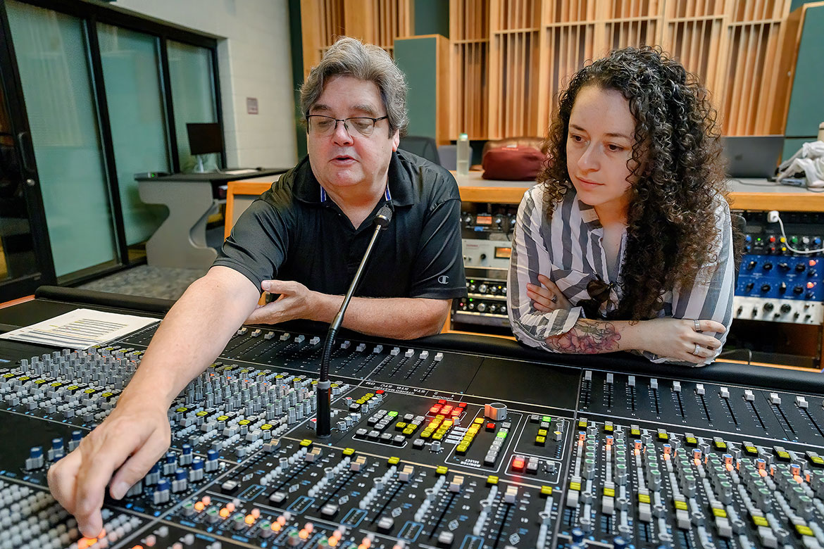 Middle Tennessee State University Department of Recording Industry professor Bill Crabtree works at the new API audio console in the College of Media and Entertainment's Studio B with Recording Arts and Technologies, Master of Fine Arts student Inti Jimenez. (Photo Andy Heidt)