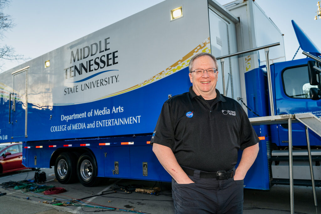 MTSU Department of Media Arts professor Robert "Bob" Gordon Jr. stands by the College of Media and Entertainment's $1.7 million Mobile Production Lab, aka "The Truck," outside the Boutwell Dramatic Arts Auditorium as his students work inside Tucker Theatre to record the MTSU Dance Theatre's 2020 Fall Dance Concert for broadcast Saturday, Nov. 21. (MTSU photo by Andy Heidt)