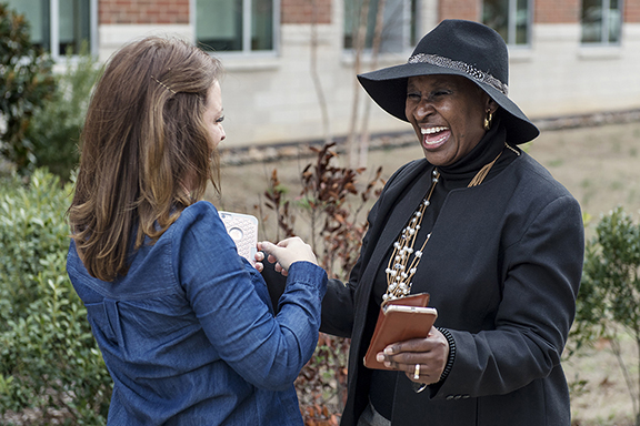 Dr. Gloria Bonner, assistant to the president in the Office of University Community Relations at MTSU, greets Leadership Rutherford Class of 2017 member and MTSU alumna Carrie Beth Catron during the group’s Feb. 1 visit to campus. Catron was a former student of Bonner’s during her years as an education professor at the university. (MTSU photo by Andy Heidt)