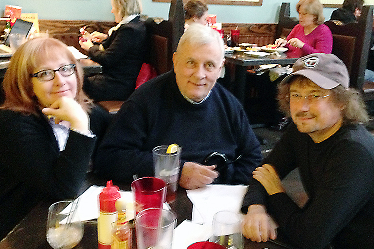 Award-winning author Edmund White, center, enjoys a visit with Nancy McGuire Roche, left, and MTSU English professor Will Brantley, right, co-editors of "Conversations with Edmund White" (Photo submitted)