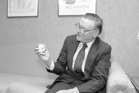 While visiting MTSU in 1988, the late Dr. James M. Buchanan holds the Nobel Memorial Prize in Economics and Science he received in 1986 “for his development of the contractual and constitutional bases for the theory of economic and political decision-making.” He is the only MTSU alumnus to be awarded a Nobel Prize. (MTSU file photo)