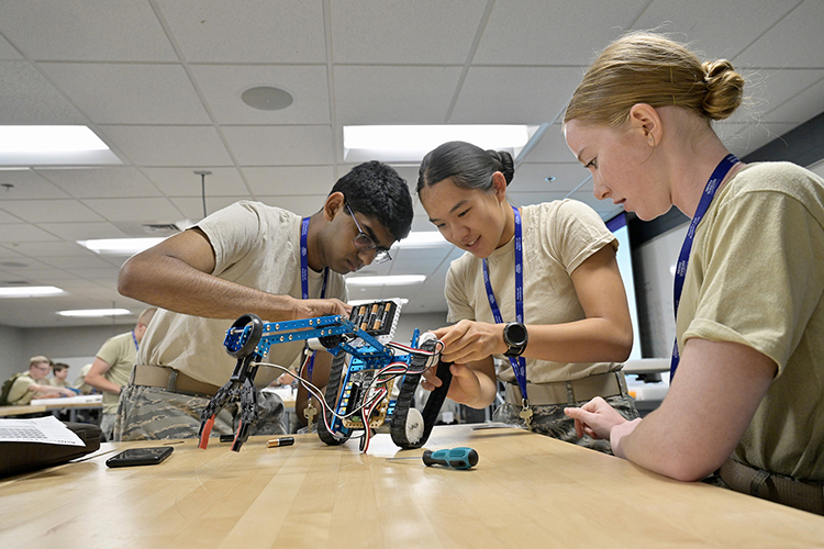 A Civil Air Patrol cadet operates a small robot Tuesday, June 28, at MTSU’s Davis Science Building. MTSU again is hosting the cadets for the U.S. Air Force volunteer civilian auxiliary’s National Cadet Engineering Technology Academy, also known as E-Tech, which runs June 26 through July 2 on the campus. (MTSU photo by Andy Heidt)
