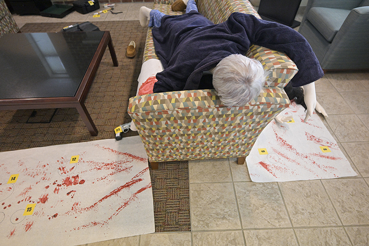 This mock crime scene awaits high school student attendees of Middle Tennessee State University’s CSI:MTSU camp hosted June 3-6 by the Forensic Institute of Research and Education on campus in Murfreesboro, Tenn. Based on the Lizzie Borden case of 1892 in which Borden murdered her father and stepmother with a hatchet, the scene provides campers an opportunity to demonstrate the forensic science knowledge they learned during the annual camp and gives them more exposure to the profession. (MTSU photo by Andy Heidt)