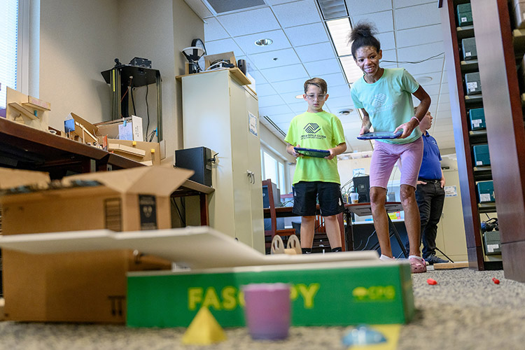 Students from the Boys and Girls Clubs of Rutherford County compete in a digital media activity during their visit to the MakerSpace in the James E. Walker Library on the campus of Middle Tennessee State University in Murfreesboro, Tenn. Students from the Boys and Girls Clubs of Rutherford County attended the 2024 “Come to Voice” summer digital media camp at MTSU. (MTSU photo by J. Intintoli)