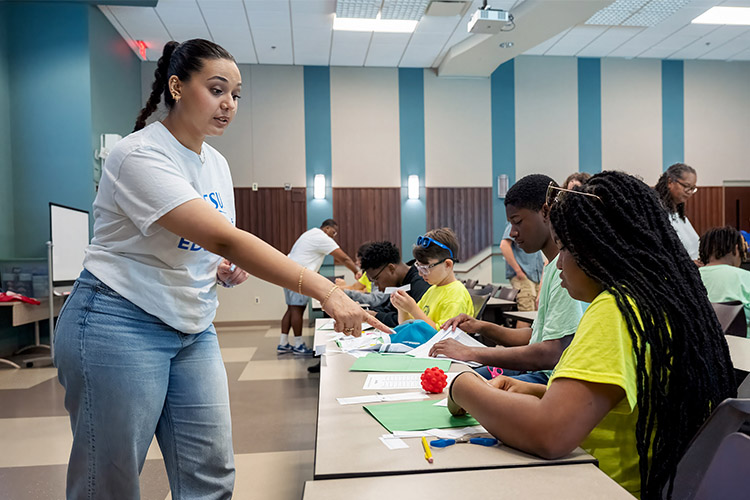 Students from the Boys and Girls Clubs of Rutherford County engage in a STEM activity, making whirly copters while visiting the College of Education during the recent “Come to Voice” summer camp sponsored by the College of Media and Entertainment, which brought 20 seventh through ninth graders to the MTSU campus in Murfreesboro, Tenn. (MTSU photo by Andy Heidt)