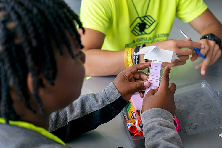 Boys and Girls Club students make whirly copters during a STEM activity in the College of Education at Middle Tennessee State University in Murfreesboro, Tenn. Students from the Boys and Girls Clubs of Rutherford County attended the 2024 “Come to Voice” summer digital media camp at MTSU. (MTSU photo by Andy Heidt)