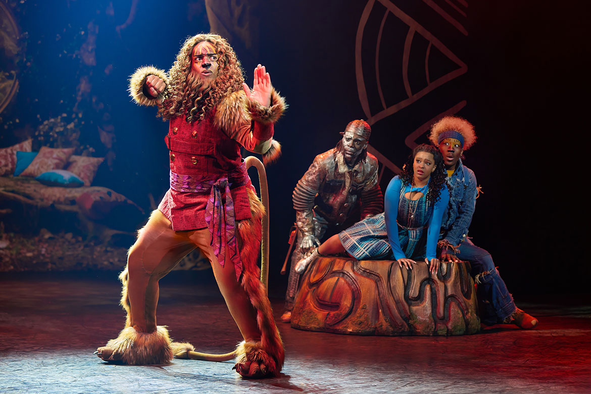 Middle Tennessee State University theatre alum Cal Mitchell, far left, is seen here performing as the Lion in the Tony Award-winning musical “The Wiz,” alongside castmates Dana Cimone, center, as Dorothy; D. Jerome as The Tinman, second from right; and Elijah Ahmad Lewis as the Scarecrow, right, in the North American tour of the show. “The Wiz” stops in Nashville at TPAC Sept. 23-28, 2025. (Photo by Jeremy Daniel)