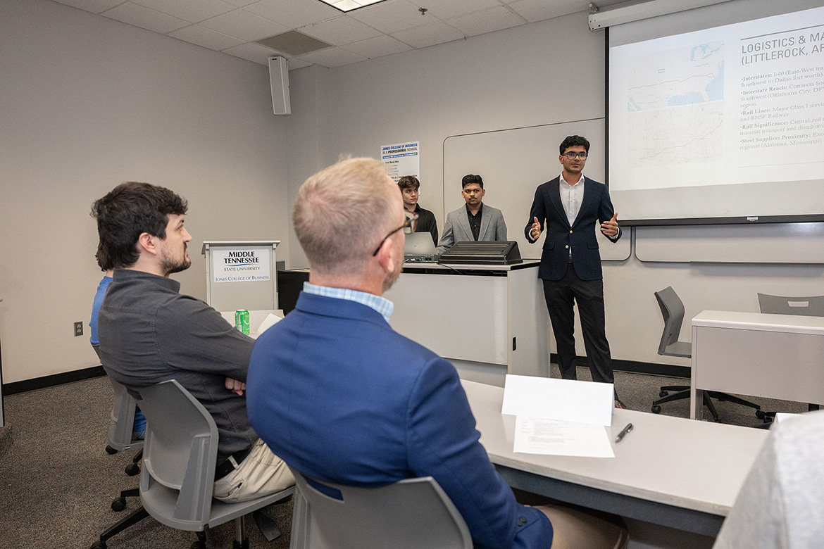 Middle Tennessee State University students give their presentation to a panel of judges during “The Call of Data” 24-hour analytics challenge held Nov. 7-8 inside the Business and Aerospace Building on campus in Murfreesboro, Tenn. (MTSU photo by Andy Heidt)