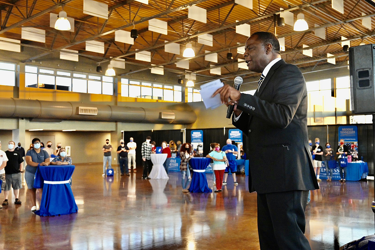MTSU President Sidney A. McPhee talks to the Clarksville, Tenn., audience attending the True Blue Tour recruiting event held Tuesday, Sept. 28, at the Wilma Rudolph Event Center. He discussed academic programs including audio production and accounting, and invited prospective students and their families to come and visit the Murfreesboro campus. (MTSU photo by Andrew Oppmann)