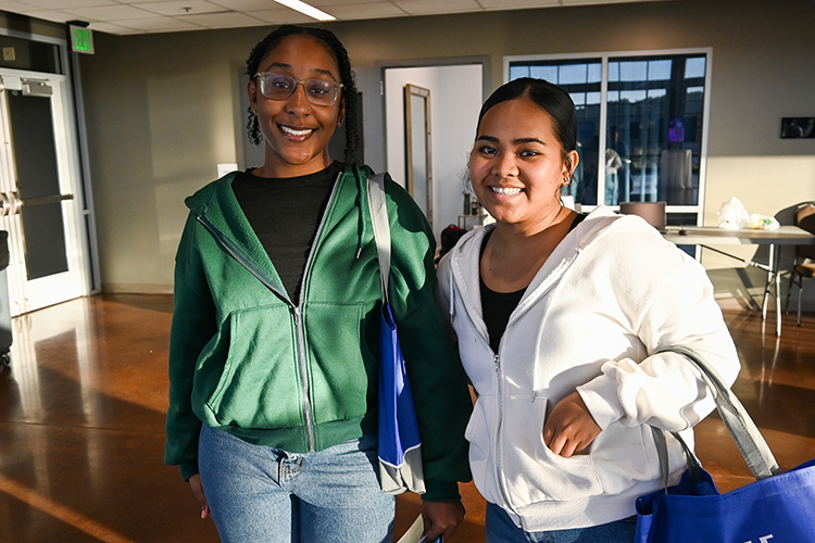 Prospective Middle Tennessee State University student Keynu Rau, left, waits in line to speak to university admissions staff with her friend, Elener Pelik, at MTSU’s True Blue Tour event on Wednesday, Sept. 28, 2022, at the Wilma Rudolph Event Center in Clarksville, Tennessee, to learn more about nursing programs after being accepted into the university the previous week. (MTSU photo by Stephanie Wagner)