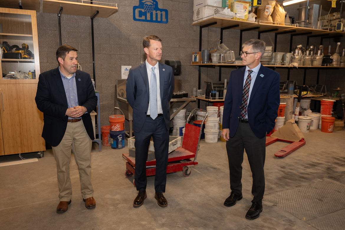 Stuart McWhorter, center, Tennessee Department of Economic Development commissioner, and Middle Tennessee State University College of Basic and Applied Sciences Dean Greg Van Patten, right, listen as MTSU Concrete Industry Management Director Jon Huddleston provides details about one of the learning laboratories in the School of Concrete and Construction Management Building Wednesday, March 26, during the commissioner’s visit to campus in Murfreesboro, Tenn. (MTSU photo by James Cessna)
