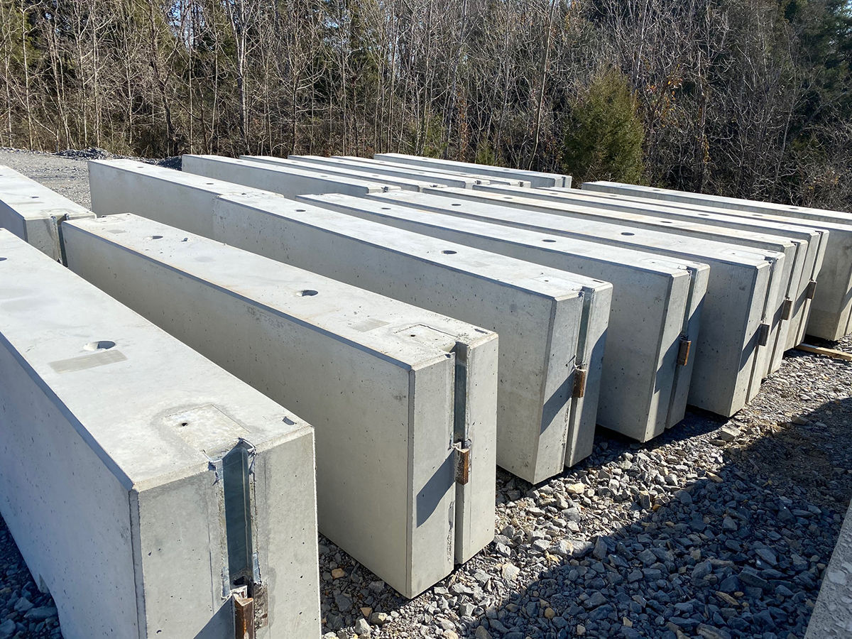 A sampling of 2,200 concrete barriers created for the Aug. 6-8 Big Machine Music City Grand Prix NTT IndyCar race in downtown Nashville, Tenn., are show at Jarrett Concrete Products in Ashland City, Tenn. In a partnership with the grand prix, MTSU Concrete Industry Management students researched and tested the mix used to create the barriers to be used in the racing events. (Submitted photo)
