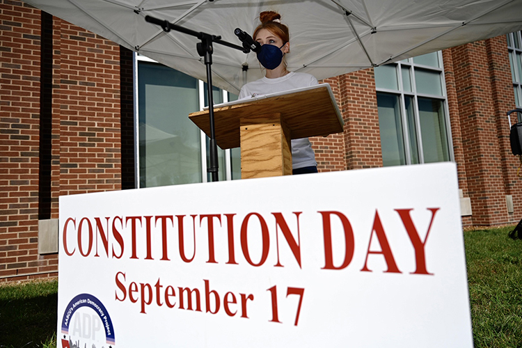 A student reads a portion of the U.S. Constitution at the Academic Classroom Building Sept. 16 during MTSU's Constitution Week celebration. (MTSU photo by J. Intintoli)