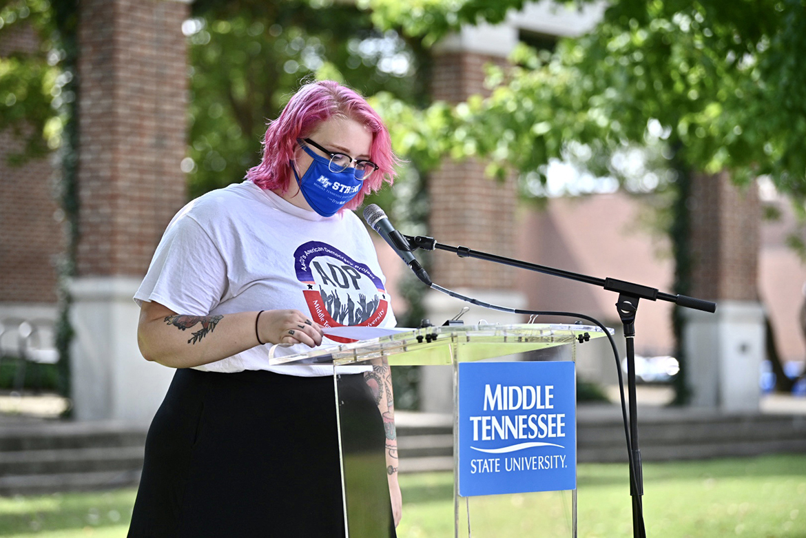Miranda Johnson, a graduate student and liberal arts major from Murfreesboro, reads a portion of the U.S. Constitution in front of the University Honors College as part of MTSU's 2020 celebration of Constitution Day. (MTSU photo by J. Intintoli)