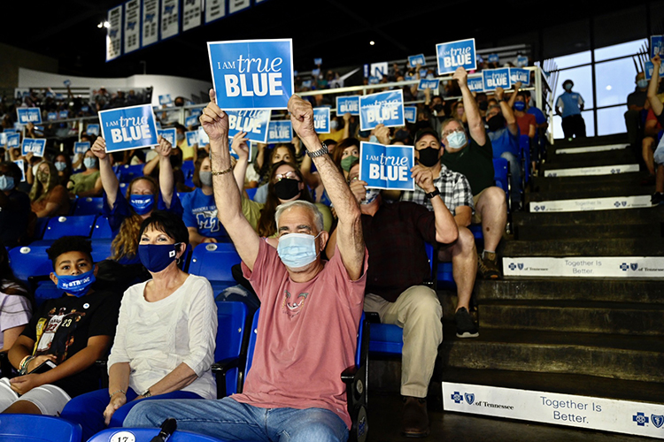 New MTSU freshmen, transfer students and their families and supporters hold up True Blue signs for a photo to commemorate the 2021 University Convocation held Saturday, Aug. 21, at Murphy Center. (MTSU photo by J. Intintoli)
