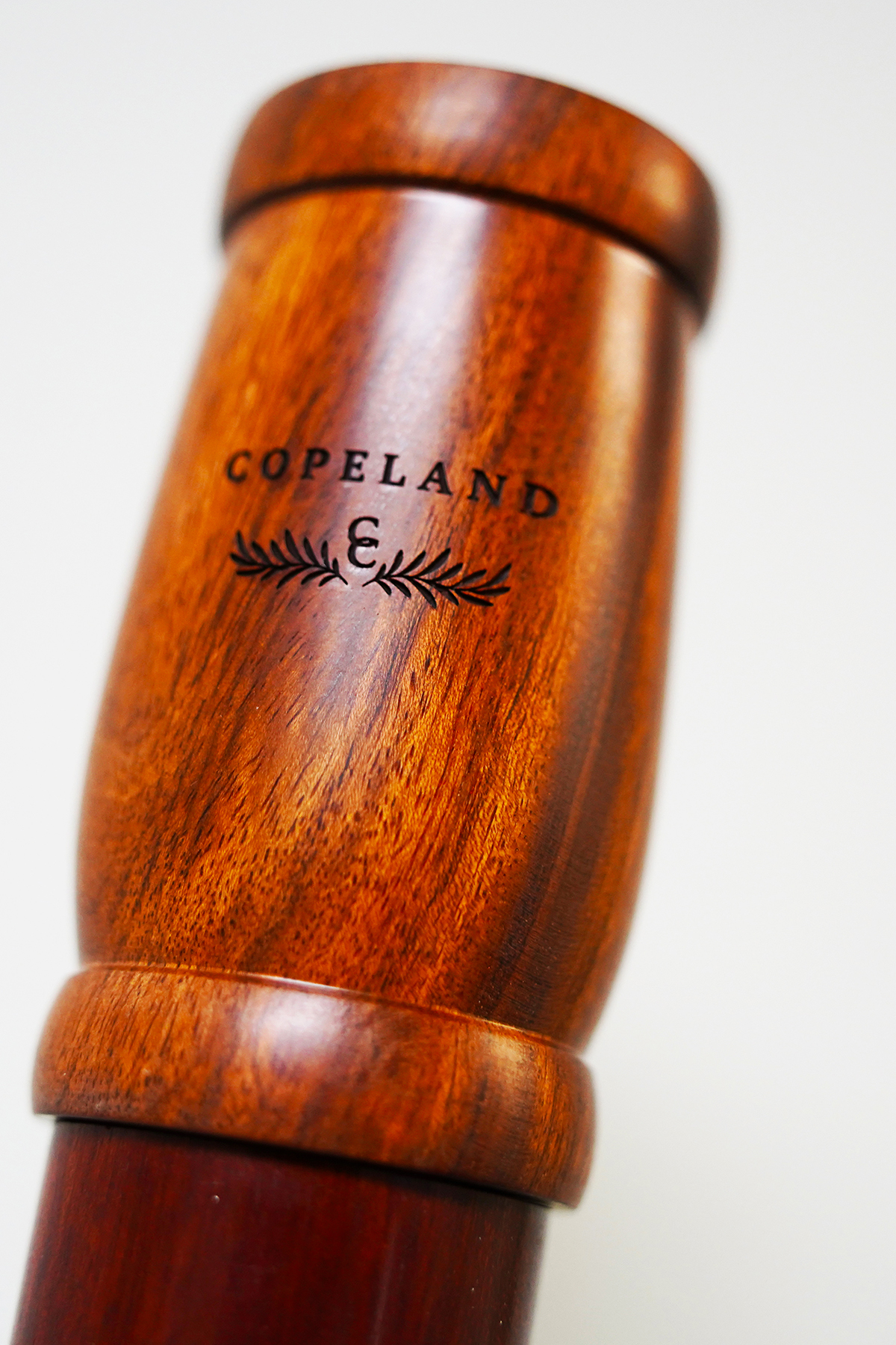 A close-up of a wooden clarinet barrel engraved with the Copeland Clarinets brand name, taken in Shelbyville, Ky., on Jan. 12, 2026. Jonathan and Ashley Copeland, both alumni of Middle Tennessee State University in Murfreesboro, Tenn., developed the brand as part of their growing family-owned instrument business. (MTSU photo by Mike Davis)