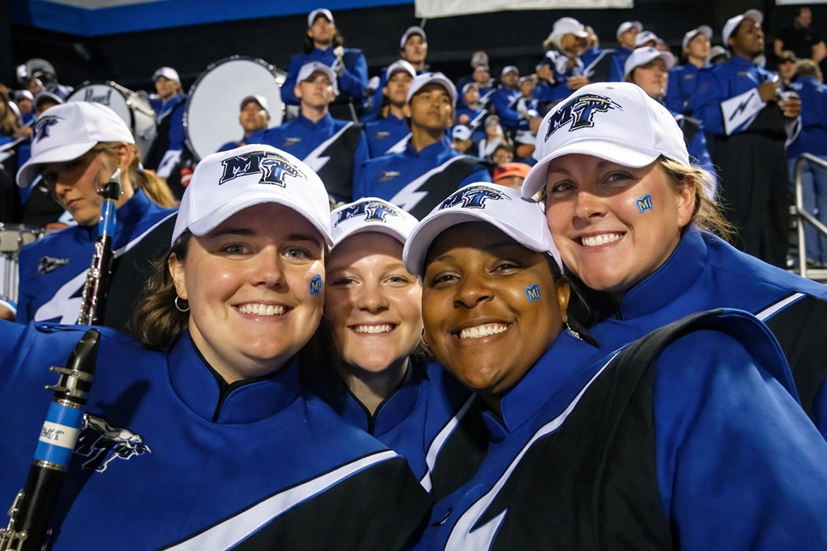 Ashley Copeland, left, performs with the Middle Tennessee State University Band of Blue during an MTSU football game in Murfreesboro, Tenn., in 2007. Copeland later earned a degree in music education from MTSU and went on to co-found Clarinets by Copeland with her husband, Jonathan, who also graduated from MTSU. (Courtesy photo)