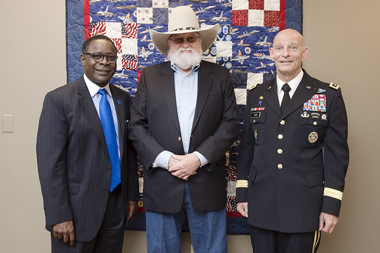 Pictured in this 2015 file photo, from left, are MTSU President Sidney A. McPhee, country music icon Charlie Daniels and retired Lt. Gen. Keith M. Huber, senior advisor for veterans and leadership initiatives, at the opening of the MTSU Veterans and Military Family Center. The center would be named in honor of Daniels and his, wife, Hazel, a year later for their support of military veterans. (MTSU file photo by J. Intintoli)