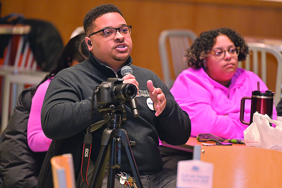Denzel Harris, a marketing major from Nashville, Tenn., poses a question to a Student Government Association vice presidential candidate at Middle Tennessee State University in Murfreesboro, Tenn., during a debate held in the Student Union Atrium on Monday, Feb. 23. SGA officer elections take place on campus Monday-Friday, March 2-5. (MTSU photo by James Cessna)