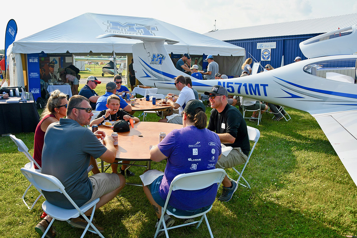 About 50 alumni from MTSU’s Aerospace Department attended a special event Wednesday night on the grounds of EAA AirVenture, the largest air show of its kind in the world. (MTSU photo by Andrew Oppmann)