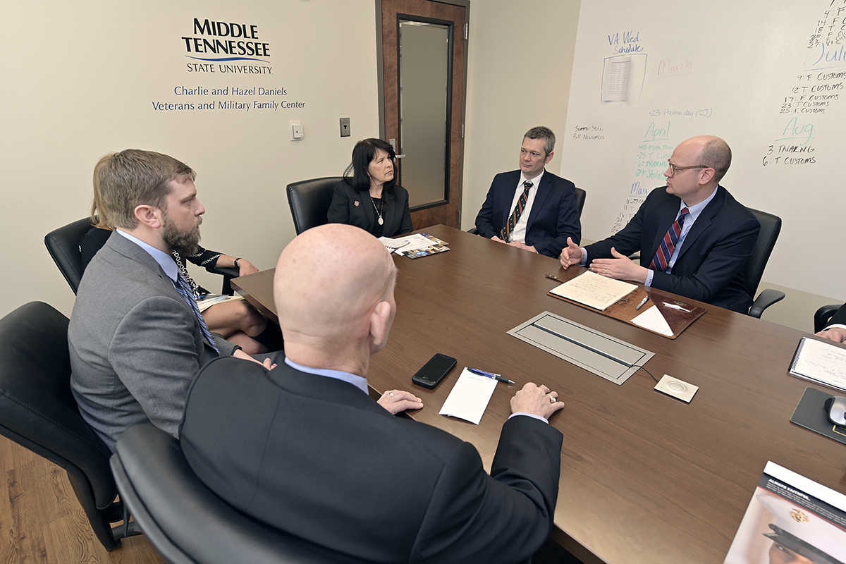 THEC Executive Director Mike Krause, top right, adds insight into assisting veterans and their families as they pursue higher education with Tennessee Department of Veterans Services Deputy Commissioner Tilman Goins, second from right, and Tennessee Department of Veterans Services Commissioner Courtney Rogers March 26 during her first visit to campus as commissioner. Listening are THEC’s Mitch Curry, left, and MTSU’s Keith M. Huber, MTSU senior adviser for veterans and leadership initiatives and a retired U.S. Army lieutenant general.