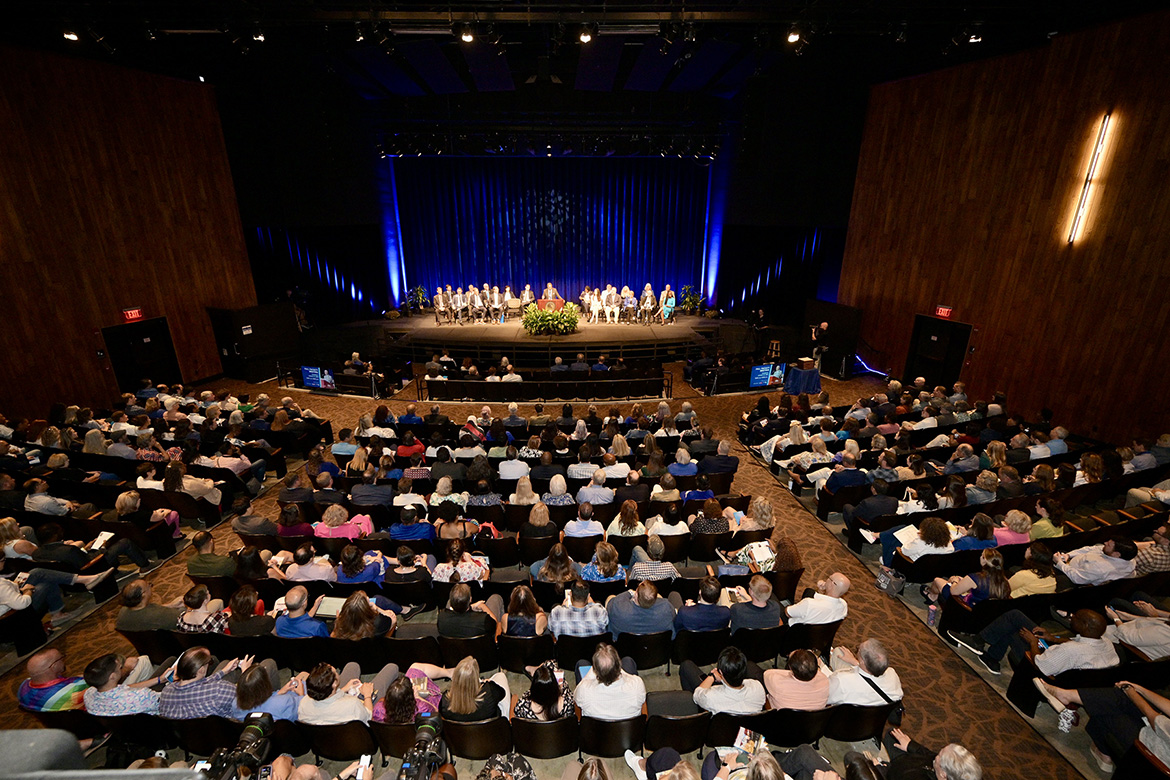 Several hundred Middle Tennessee State University faculty and staff listen as MTSU President Sidney A. McPhee, on the podium, gives his State of the University Address at the 2025 Fall Faculty and Staff Meeting held Thursday, Aug. 21, inside Tucker Theatre on campus in Murfreesboro, Tenn. (MTSU photo by J. Intintoli)