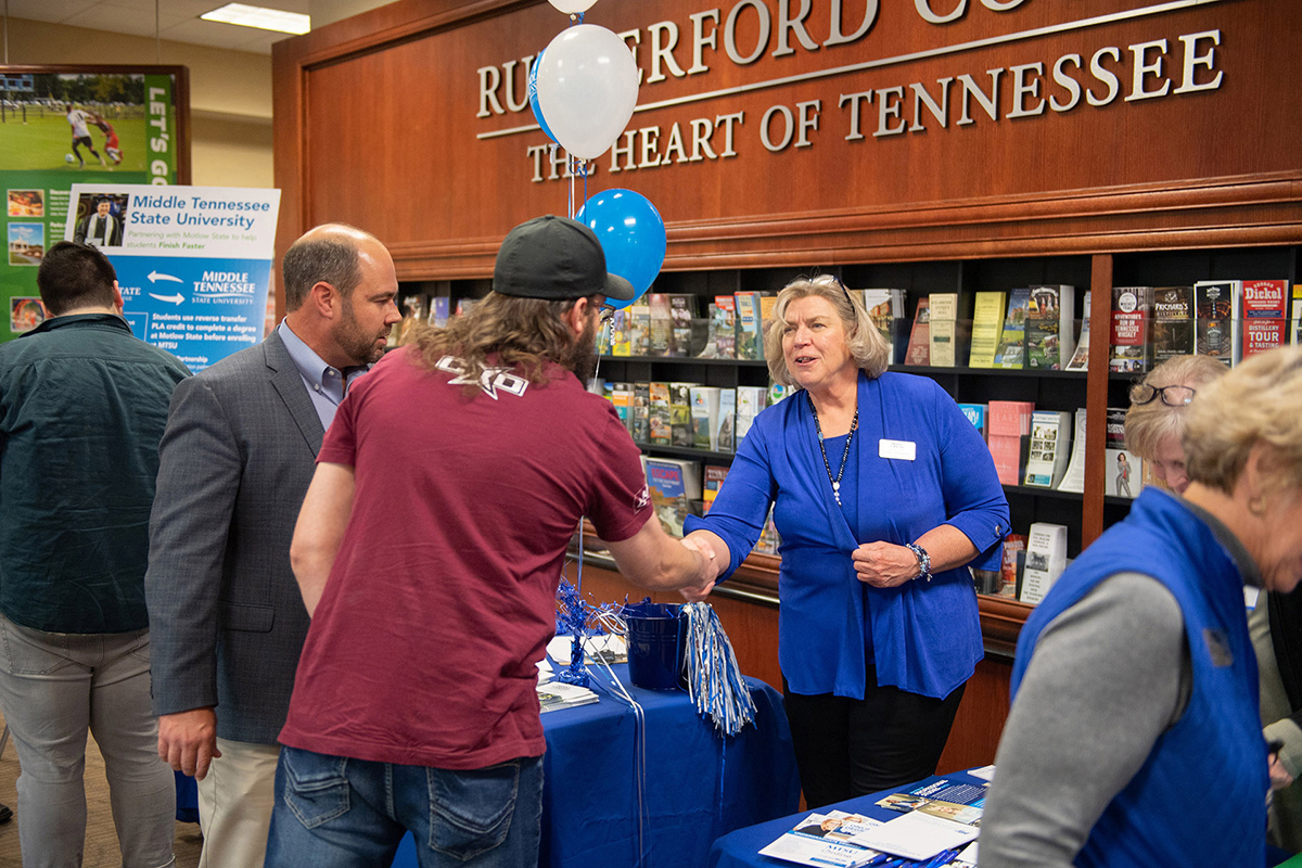 In this file photo, MTSU staff answers questions at a Finish Your Degree Q-and-A event for prospective students in late October 2019 at the Rutherford County Chamber of Commerce in Murfreesboro, Tenn. The college will hold a similar event April 13, 2021, at the chamber under COVID-19 protocols. (MTSU file photo by James Cessna)