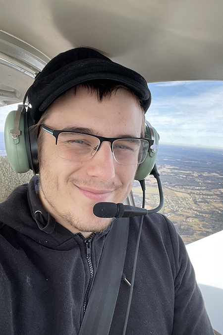 Joseph Fisher, junior aerospace student at Middle Tennessee State University, poses for a photo up in the air, training to become a pilot at the university he gets to attend with four of his siblings, the group of five meeting up for study dates on campus and sharing the True Blue experience together. (Submitted photo)