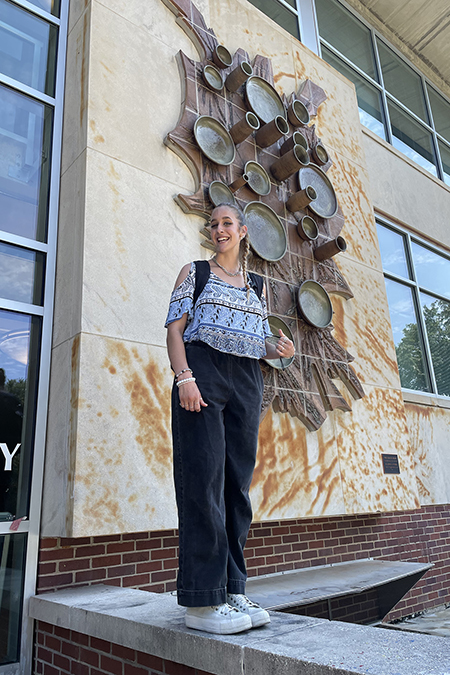 Raquel Fisher, sophomore student at Middle Tennessee State University, takes a photo outside the Andrew Todd Hall on campus, where she is not only exploring her interest in nursing but also gets to attend the university with four of her siblings, the group of five meeting up on campus for study dates and sharing the True Blue experience together. (Submitted photo)