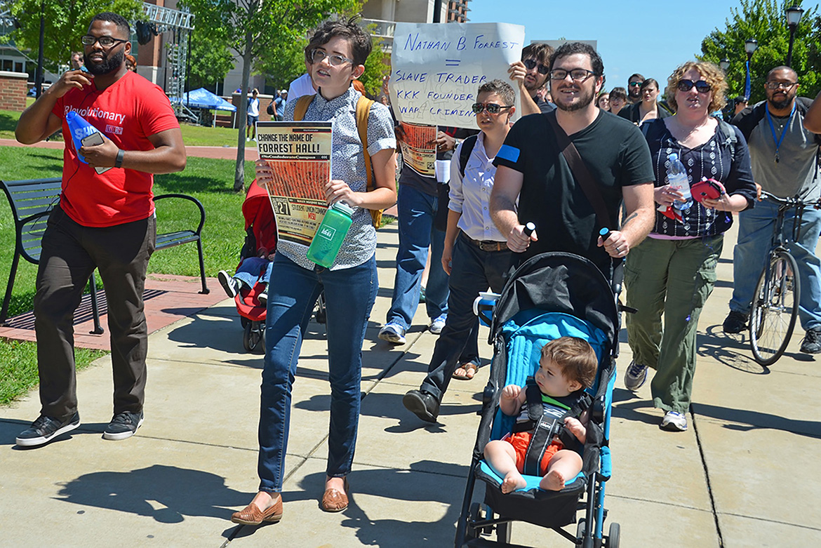 In this August 2015 file photo, MTSU students, alumni and others wanting to change the name of Forrest Hall walk in an organized protest from the Student Union Commons to the building that houses the military science program. Forrest Hall is named for Confederate Gen. Nathan Bedford Forrest. (MTSU photo by Randy Weiler)