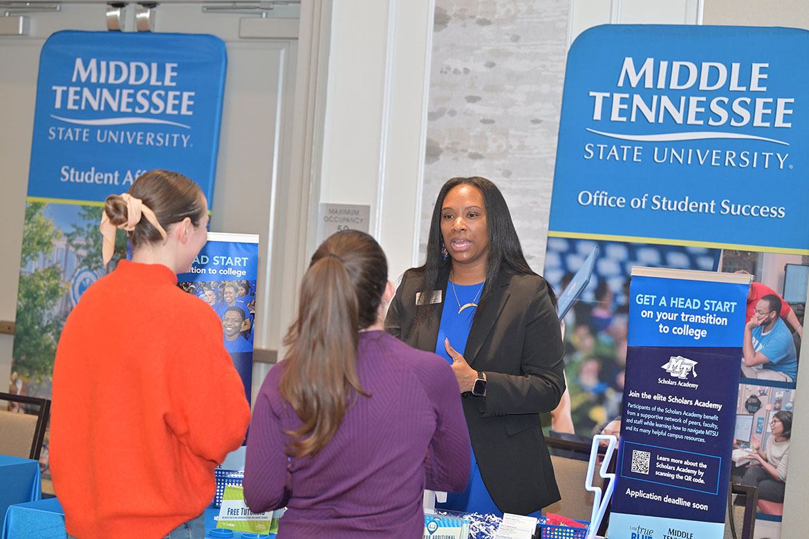 Michelle Arnold, associate vice provost for the Office of Student Success, talks with school counselors at the final True Blue Tour counselor and advisor luncheon held Thursday, Nov. 13, at Franklin Marriott Cool Springs. A total of $65,000 in scholarships was given to each of the 24 institutions represented that day. (MTSU photo by James Cessna)