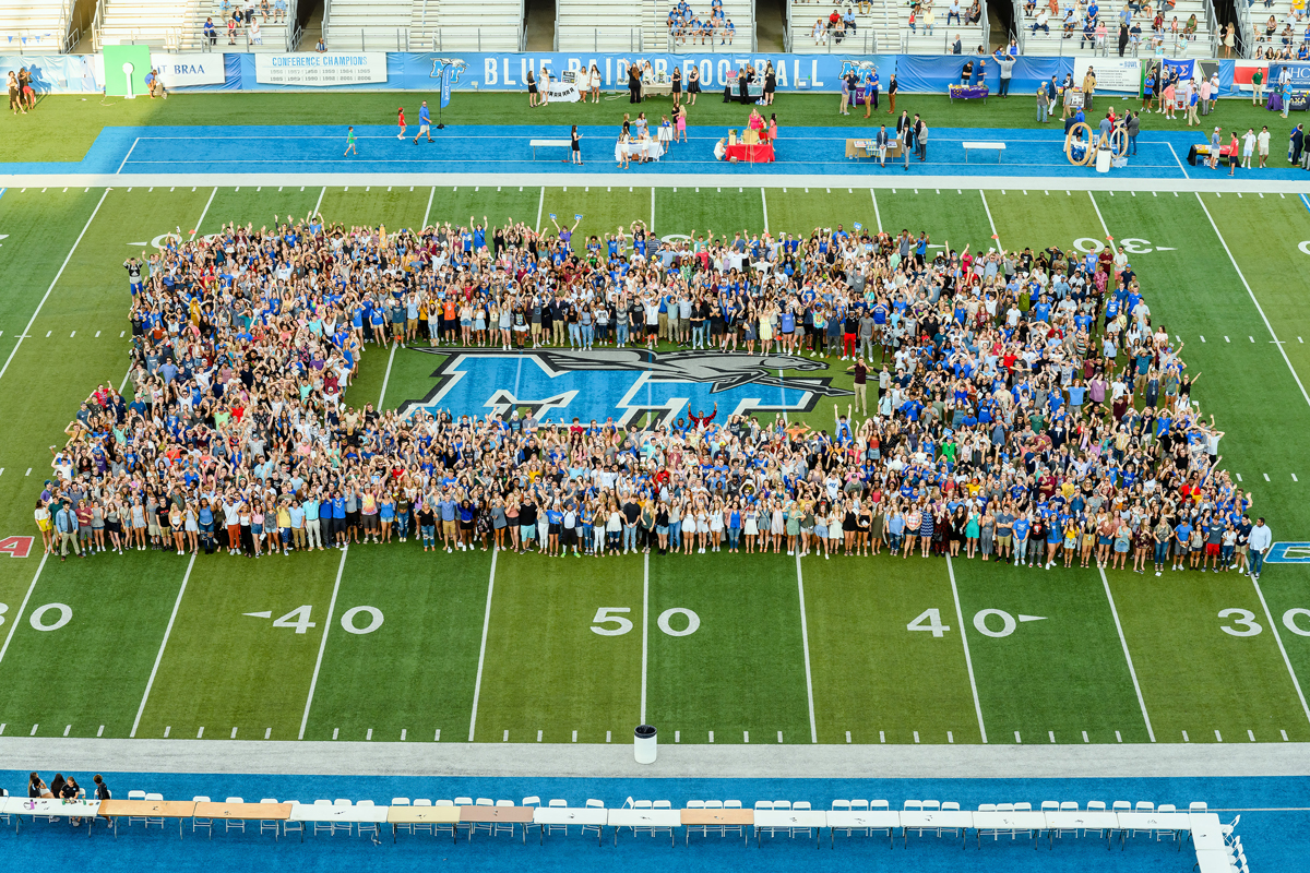 The 2019-20 MTSU freshman class — aka Class of 2023 — gathers on the turf of Horace Jones Field in Floyd Stadium for a group photo as part of University Convocation, the President’s Picnic and MT Athletics Fan Day Saturday, Aug. 24. (MTSU photo by J. Intintoli)