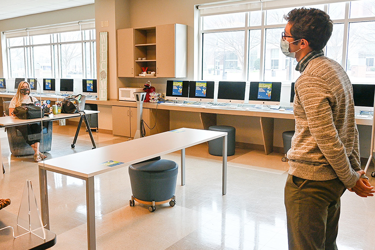 Jonathan Gogal, a Middle Tennessee State University graduate student, stops by the College of Education’s Teacher Candidate HUB — a unique lounge and study area for the college’s student teachers — as part of his work as an administrative assistant on March 9, 2021. (MTSU photo by Stephanie Barrette)