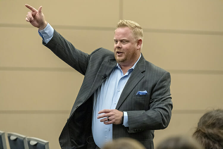 Keynote speaker Dennis Phillips II, a mortgage lender for iServe Residential Lending’s Murfreesboro location, makes a point Nov. 14 in the MTSU Student Union Ballroom as part of Global Entrepreneurship Week activities hosted by the Jones College of Business. (MTSU photo by Andy Heidt)