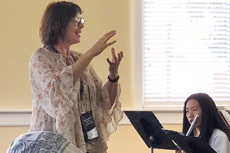 MTSU School of Music flute professor Deanna Little keeps time for a group of young instrumentaL music students attending the 2021 Governor's School for the Arts at MTSU during a June 22 workshop in the university's Tom Jackson Building. Nearly 300 11th and 12th graders from across Tennessee attended the monthlong residency program in person for intensive training in music, theater, visual arts, dance and filmmaking. (MTSU photo by Gina E. Fann)