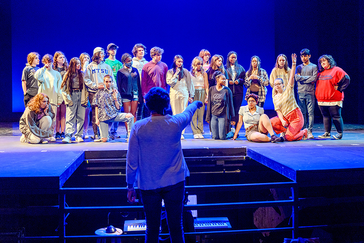 MTSU Department of Theatre and Dance professor Kate Goodwin talks with a group of young theater students attending the 2021 Governor's School for the Arts at MTSU during a June 23 rehearsal on the university's Tucker Theatre stage. Goodwin is chair of the Governor's School Theatre Division. Nearly 300 11th and 12th graders from across Tennessee attended the monthlong residency program in person for intensive training in music, theater, visual arts, dance and filmmaking. (MTSU photo by J. Intintoli)
