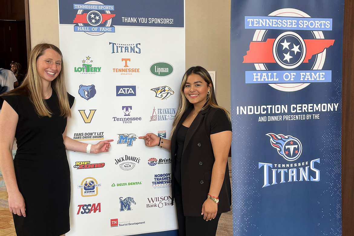 Middle Tennessee State University students, Emily Chubb, left, a Tourism and Hospitality Management program major, and Genesis Sanchez Maldonado, a Business Management major, served as part of a cohort of college students from across the state who were chosen to help with the Tennessee Sports Hall of Fame induction ceremony and banquet held in Nashville, Tenn., on Saturday, July 19. (Submitted photo)