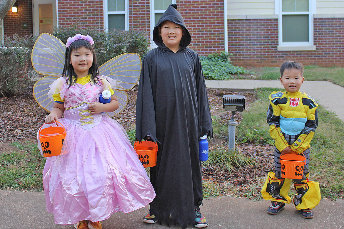 A trio of trick-or-treaters pose with their bounty at a previous Trick or Treat on Greek Row in this 2024 file photo. Children ages 12 and younger participate in this year’s free event, set for 5-7 p.m. Tuesday, Oct. 28, in front of the sorority houses at Rutherford Boulevard and Alumni Drive on the campus of Middle Tennessee State University in Murfreesboro, Tenn. (Submitted photo)