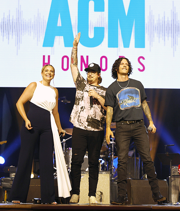 MTSU Department of Recording Industry alumnus Hardy, center, raises his hand to recognize his co-writer, Hillary Lindsey, after performing their platinum-selling "One Beer" with guests Lauren Alaina, left, and Devin Dawson Aug. 25 Aug. 25 at the 14th annual ACM Honors at the Ryman Auditorium in Nashville. Both Lindsey and Hardy were nominated as the Academy of Country Music's songwriter of the year. The show will be broadcast on Circle TV on Tuesday, Nov. 23, at 7 p.m. Central with an encore presentation at 11 p.m. Central. (photo by Jason Kempin/Getty Images for Academy of Country Music)