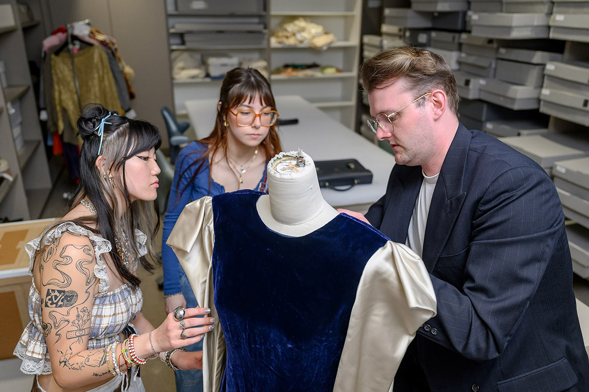 Students from Middle Tennessee State University in Murfreesboro, Tenn., from left, Roe Brien, Brooklyn Barton and Jacob Jernigan, assemble garments for the current exhibit, “Retro Rewind: Treasures from the Historic Costume Collection," on display in Todd Art Gallery in Todd Hall, 524 Old Main Circle on the campus of Middle Tennessee State University in Murfreesboro, Tenn. The free exhibit is open through Saturday, March 22. (Photo by J. Intintoli)