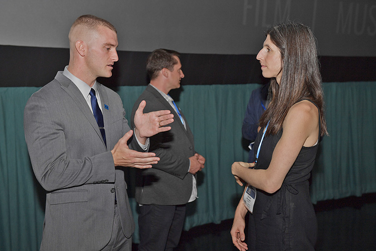 MTSU doctoral candidate and Marine veteran Corbitt Huseth, left, chats with Danielle Bernstein, producer, editor and co-director of the documentary “Homemade,” following a screening of the film Thursday, Oct. 10, at Regal Hollywood 27 as part of the Nashville Film Festival. MTSU is a festival sponsor. (MTSU photo by James Cessna)